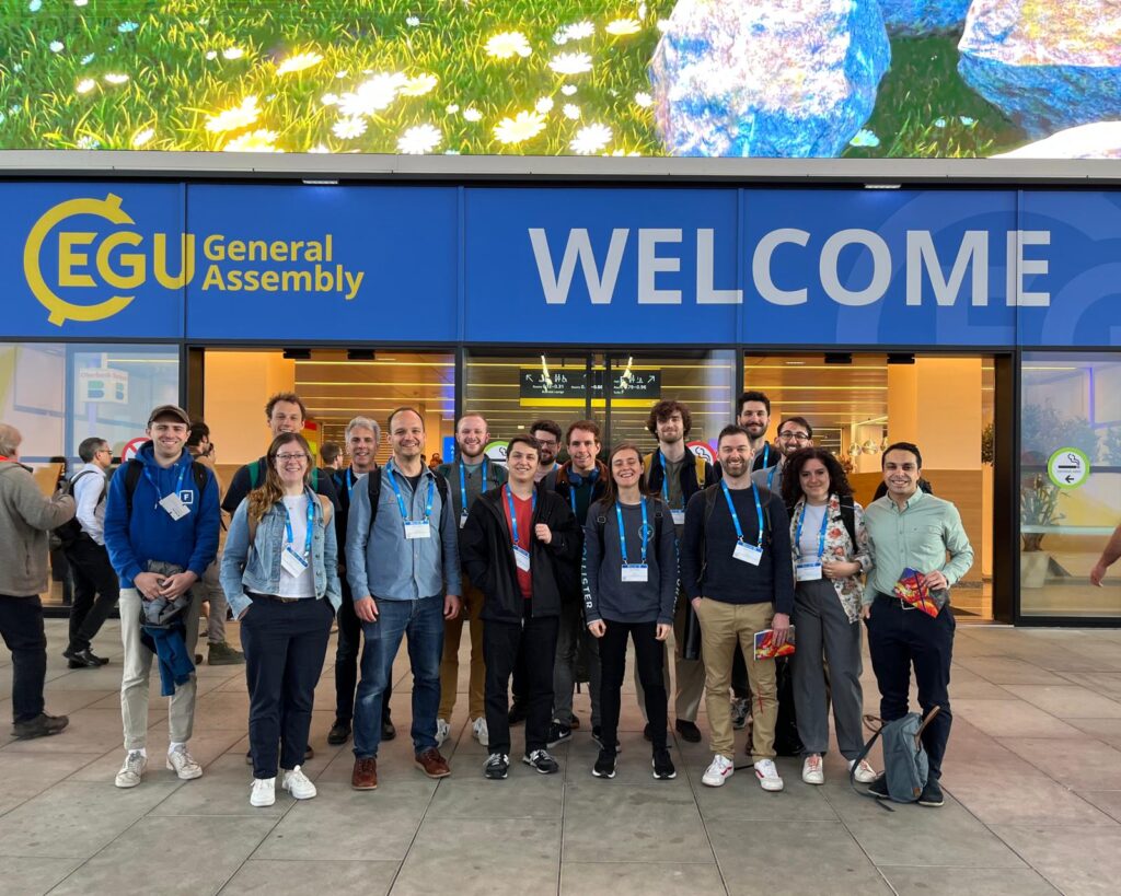 the Fathom team at EGU23 in front of the welcome sign